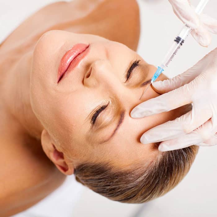 botox injection on model's forehead