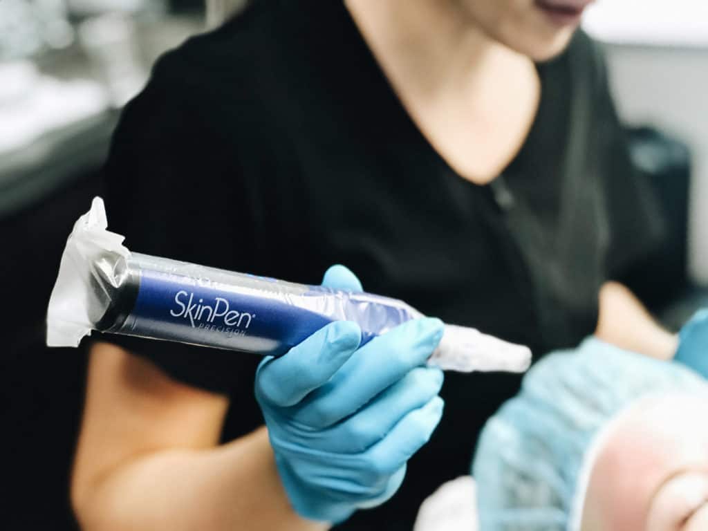 aesthetician holding SkinPen