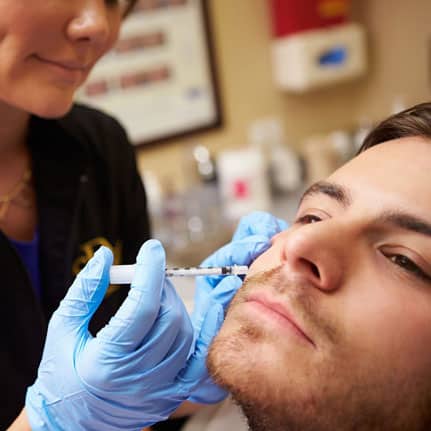 botox on male model's face