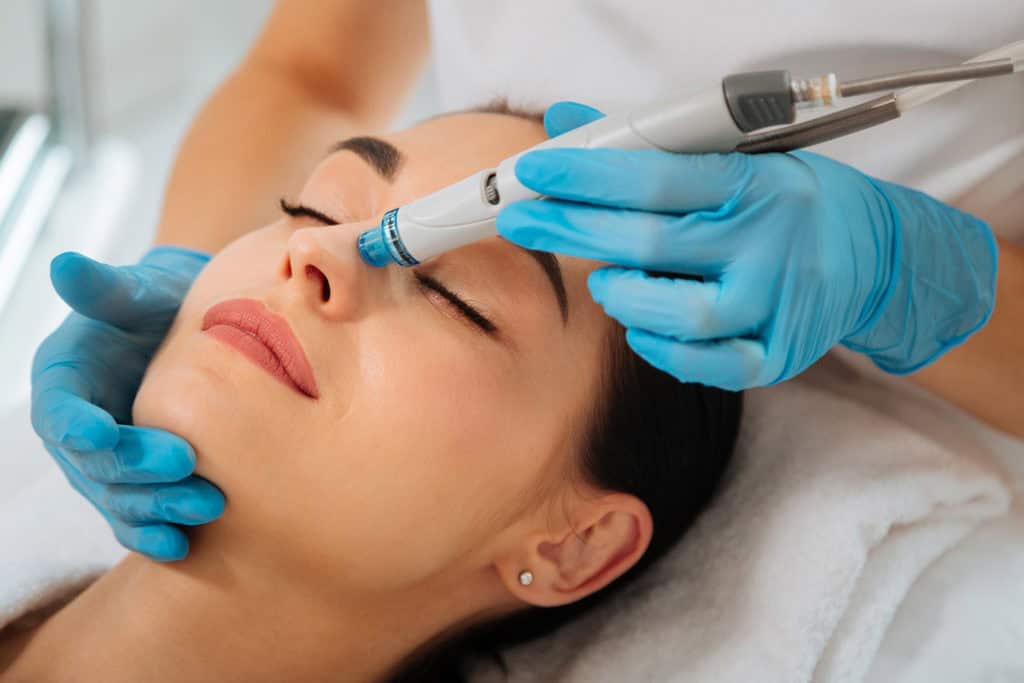 hydrafacial treatment on model's nose