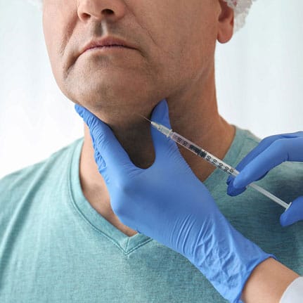 kybella treatment on male client