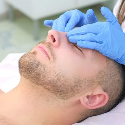 Chemical Peels service on male client's face