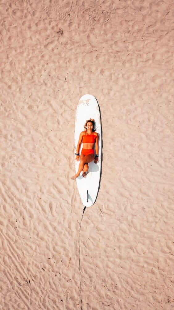 woman on surfboard