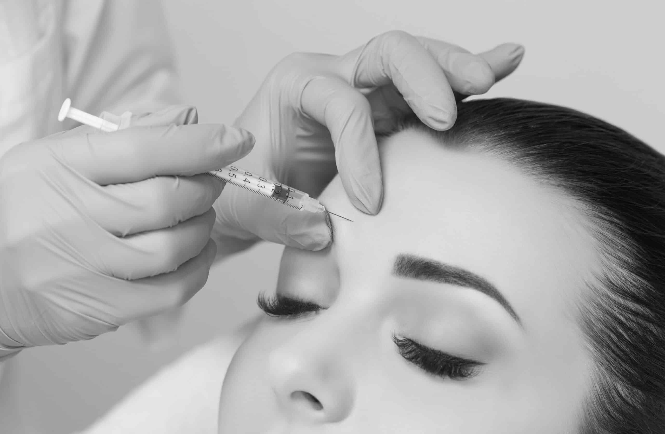 model getting botox on forehead