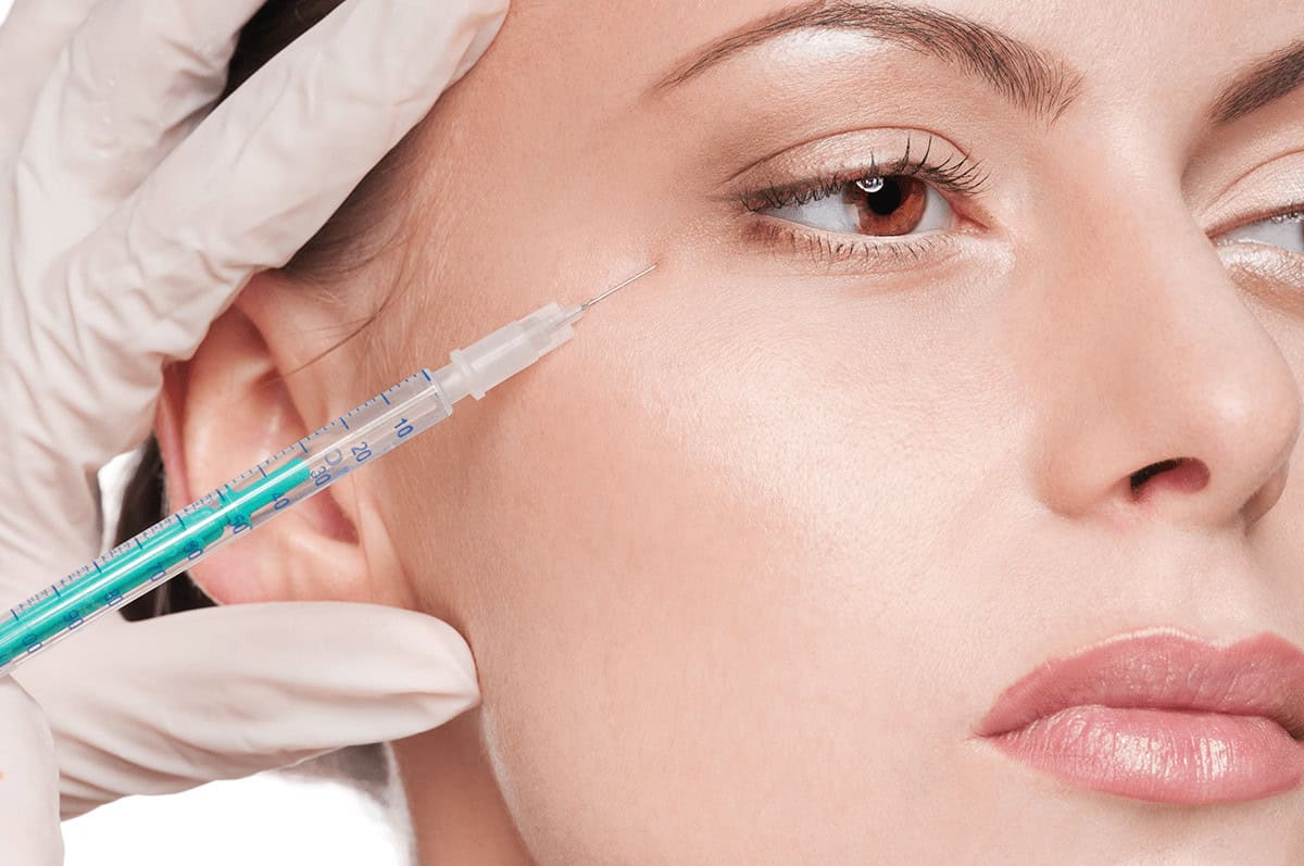 model getting botox around eye