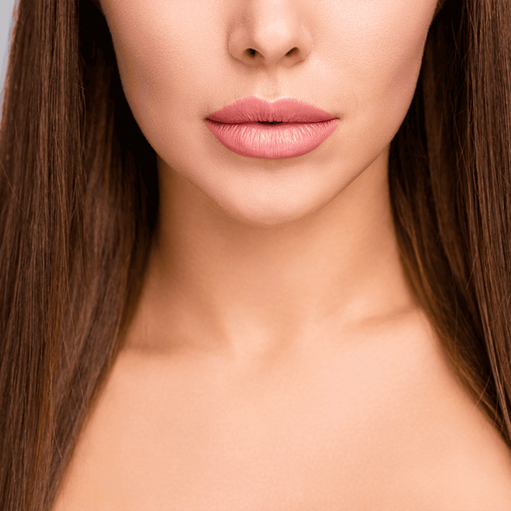 closeup of model's lips and neck